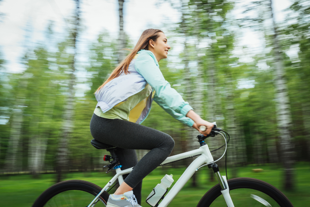 Quais exercícios que gastam calorias? 2 bicicleta mulher 2